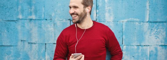 photo-of-a-man-listening-music-on-his-phone-846741